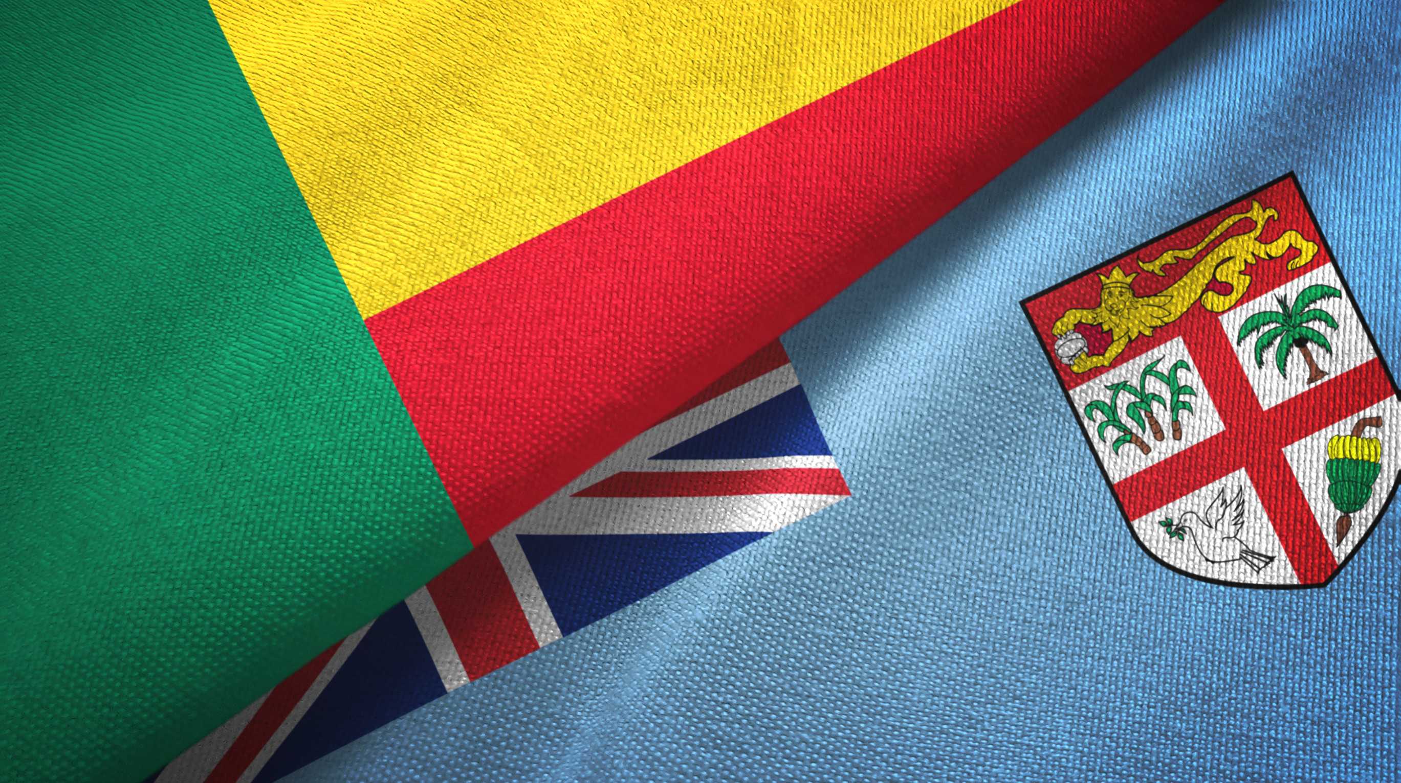 Benin And Fiji Two Folded Flags Together