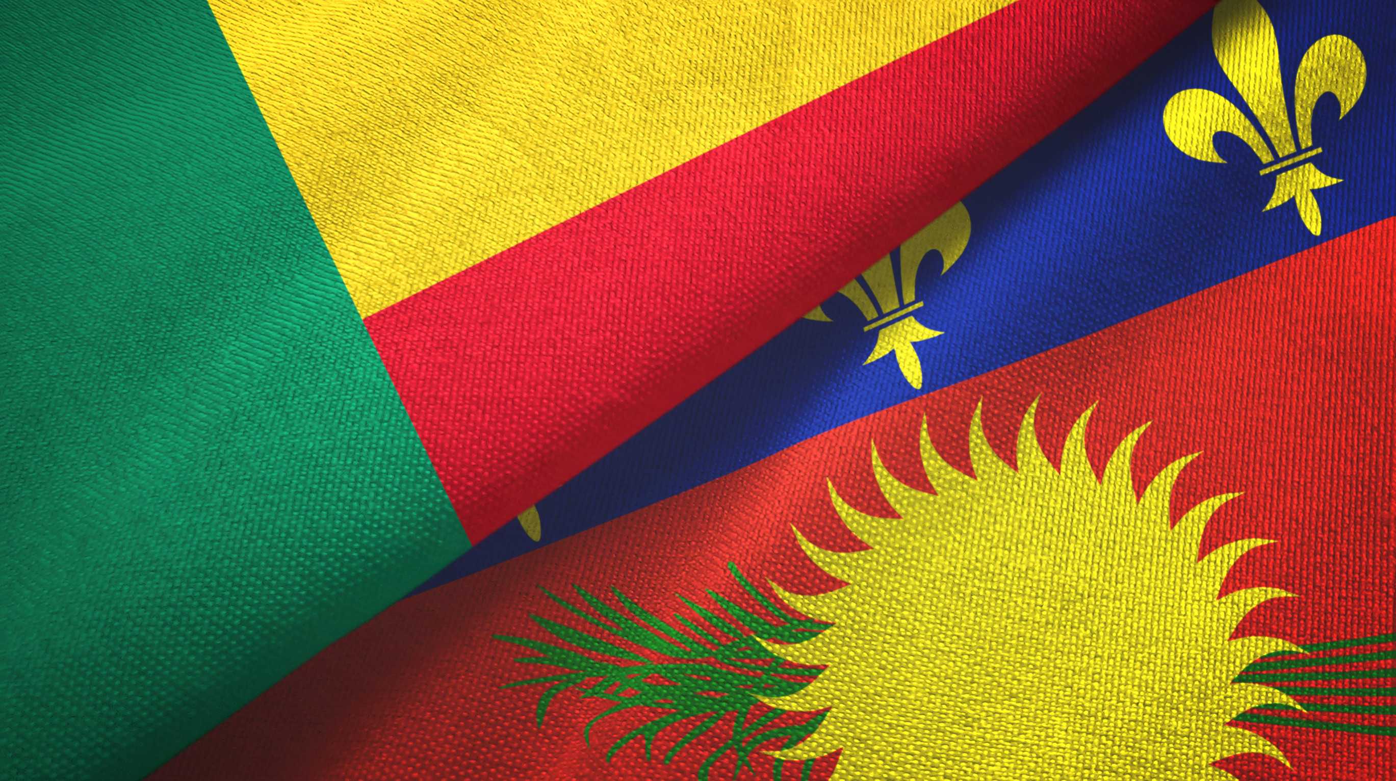 Benin And Guadeloupe Two Folded Flags Together