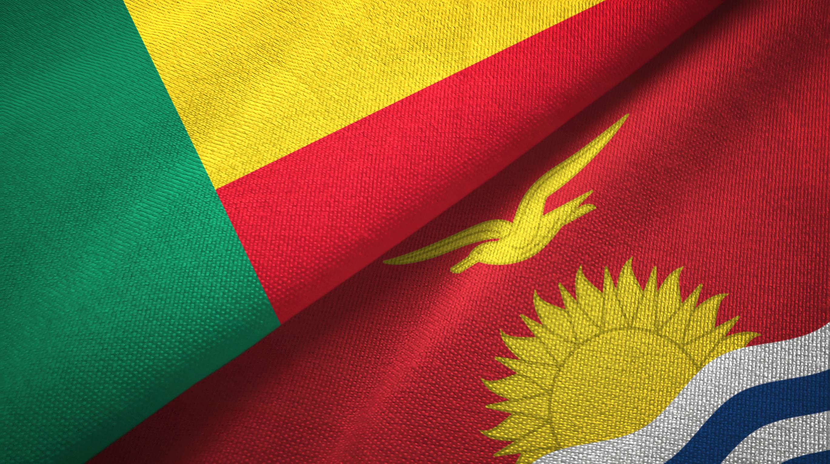 Benin And Kiribati Two Folded Flags Together