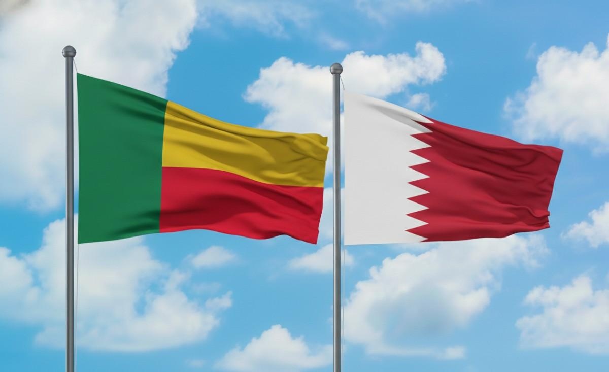 Benin And Qatar Flags Waving Together
