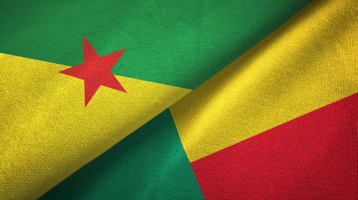 French Guiana And Benin Two Folded Flags Together