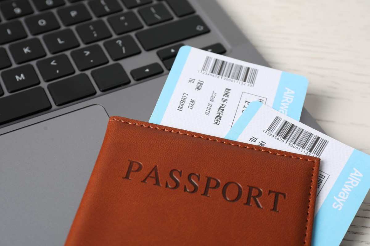 Passport Flight Tickets And Laptop